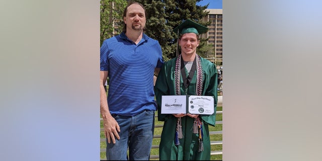 Shane Lloyd and son Jakob Lloyd at graduation