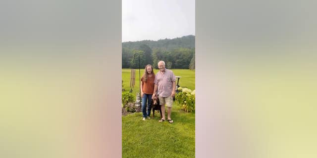 The Ecklunds photographed with Tucker at centerit