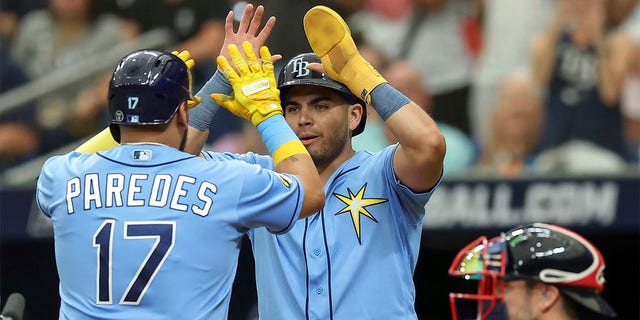 Isaac Paredes celebrates with Jonathan Aranda