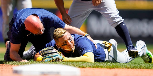 Isaac Paredes on his stomach