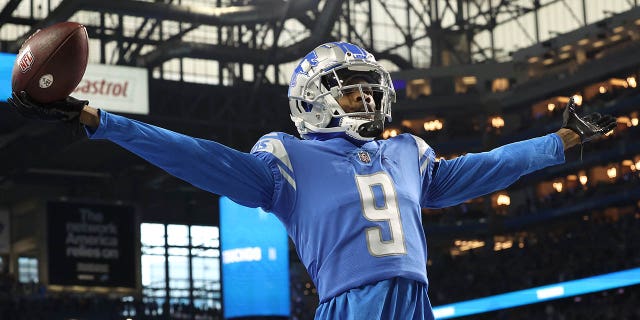Jameson Williams celebrates