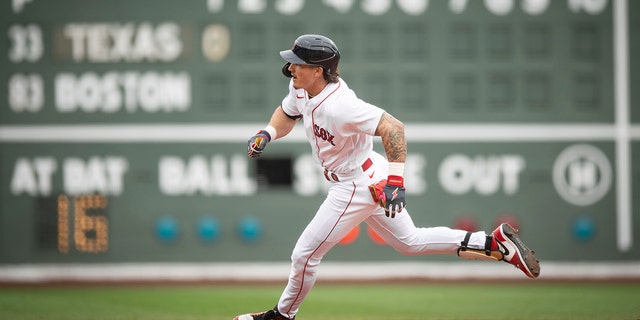 Jarren Duran runs after a hit