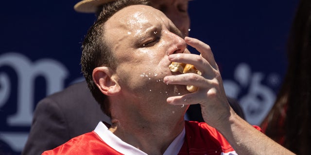 Joey Chestnut mows down hot dogs