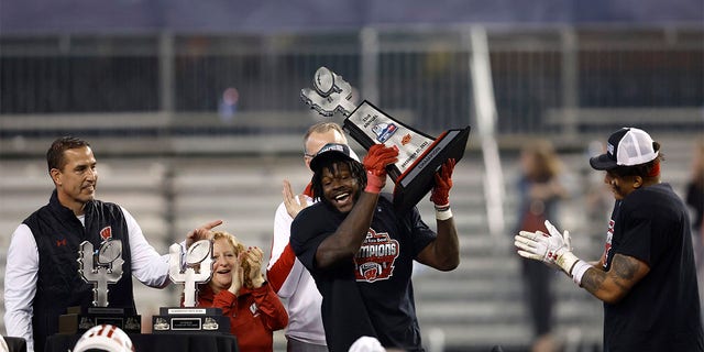 Jordan Turner hoists trophy