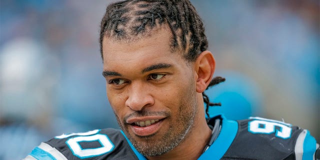 Julius Peppers looks on