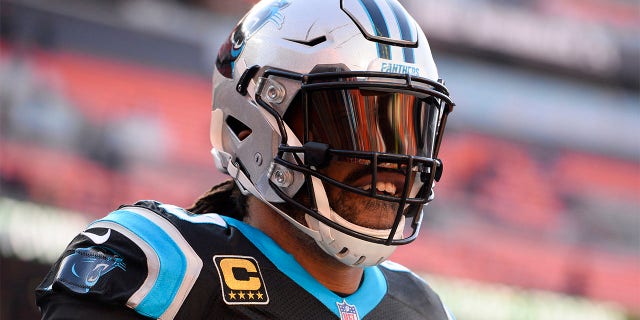 Julius Peppers looks on