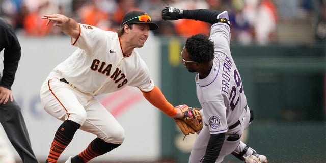 Casey Schmitt tags Jurickson Profar out