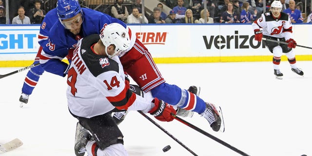 KAndre Miller checks Nathan Bastian