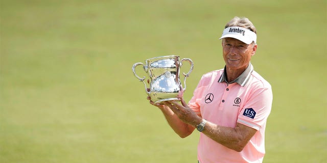 Bernhard Langer poses with trophy