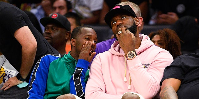 LeBron James and Rich Paul sit courtside during the BIG3 Championship