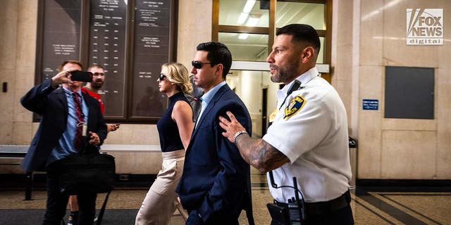Accused rapist Matthew Nilo and fiancee escorted through courthouse