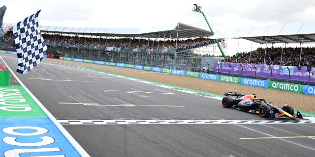 Max Verstappen crosses finish line