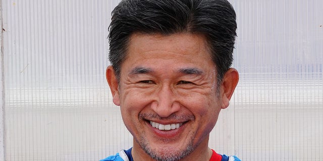Kazu Miura smiles
