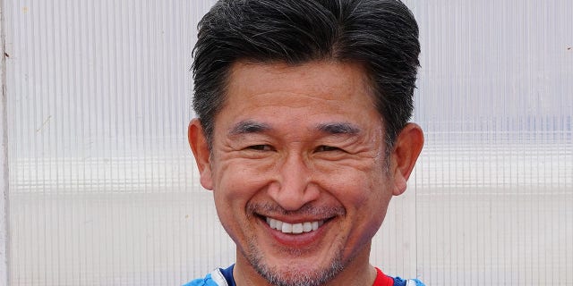 Kazu Miura smiles