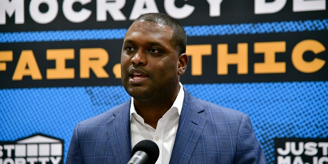 Former Rep. Mondaire Jones speaking at a press conference