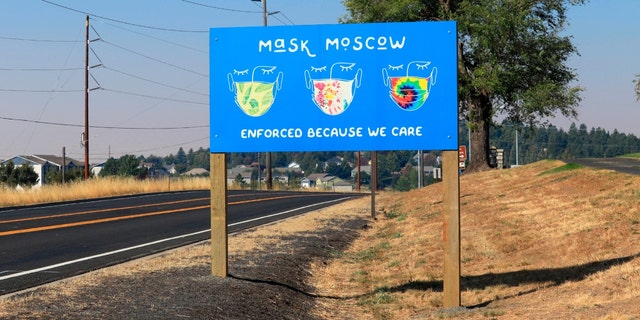 A 'mask moscow' sign along road in Moscow, Idaho