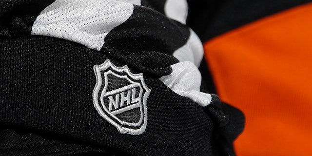 NHL logo on the referee