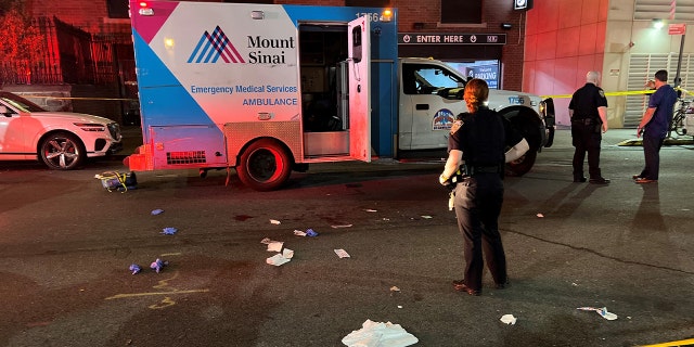 Ambulance parked with door open after EMT stabbed
