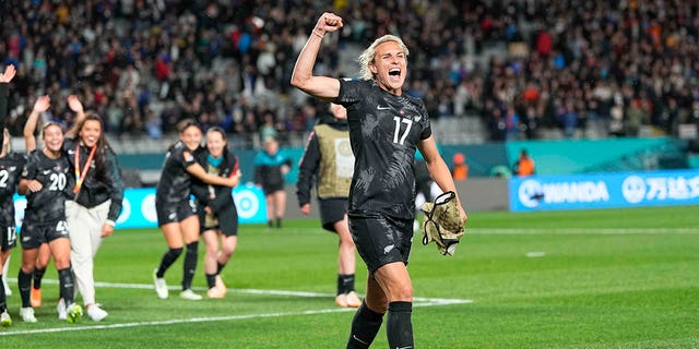 Hannah Wilkinson celebrates winning a World Cup match