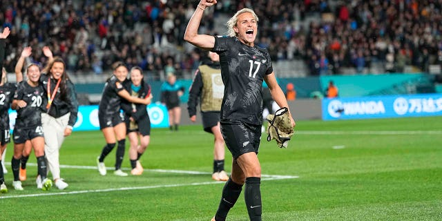 Hannah Wilkinson celebrates winning a World Cup match