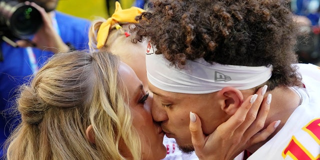 Brittany and Patrick smooch