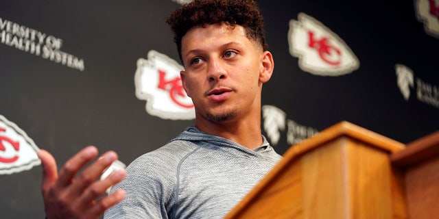 Patrick Mahomes talks to reporters