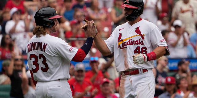 Paul Goldschmidt is congratulated by Brendan Donovan