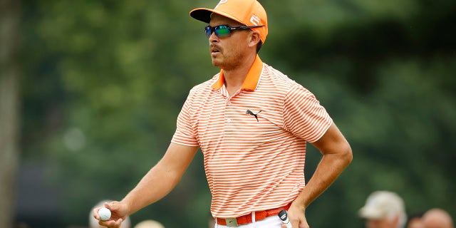 Rickie Fowler walks on course