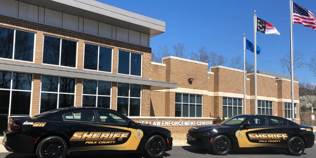 Polk County police cars outside building