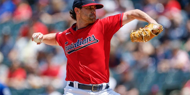 Shane Bieber throws pitch