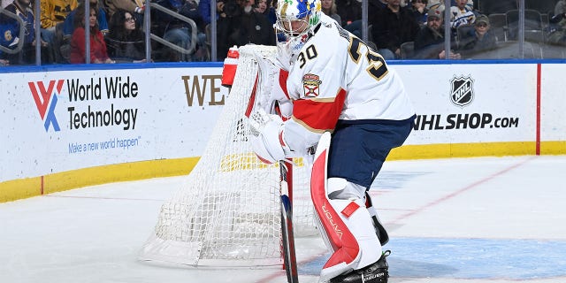 Spencer Knight plays puck