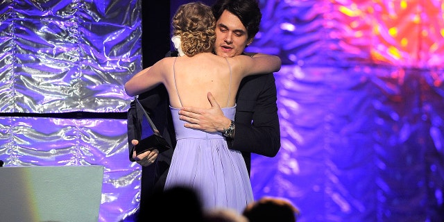 Taylor Swift and John Mayer share a hug