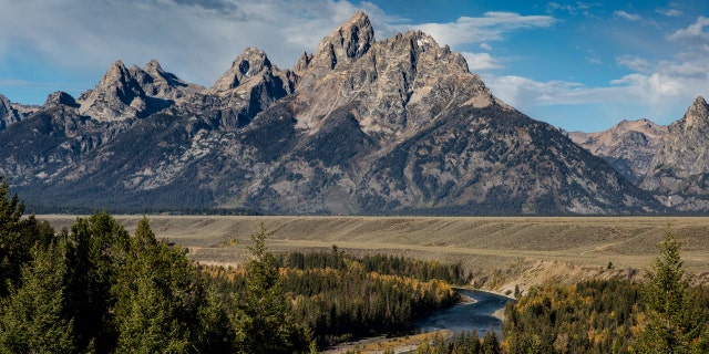 The Grand Teton Mountain Range is viewed from the Snake River Overlook