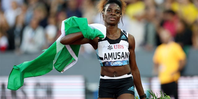 Tobi Amusan celebrates