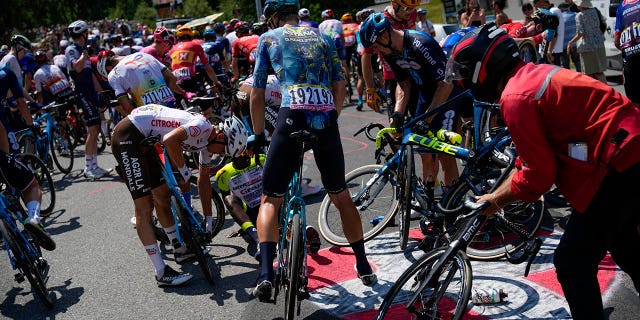 Riders crash in the 15th stage