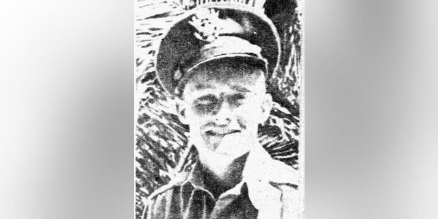 Lewis smiling in uniform