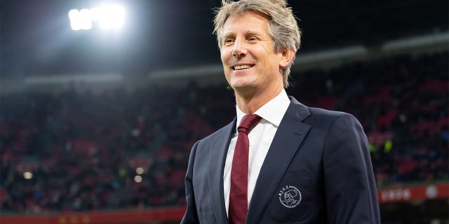 Edwin van der Sar looks on