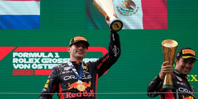 Max Verstappen hoists trophy