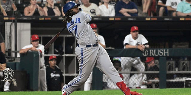 Vladimir Guerrero Jr. watches home run