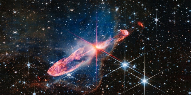 A tightly bound pair of actively forming stars