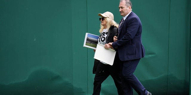 Protester arrested by security at Wimbledon