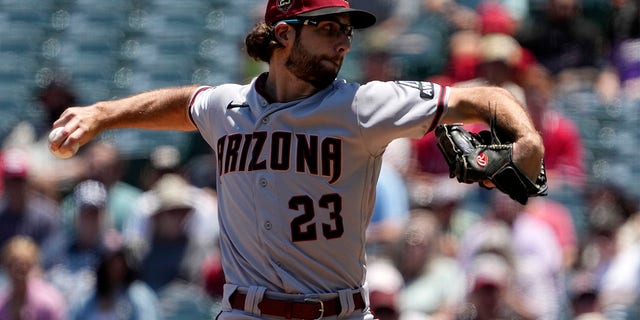 Zac Gallen throws pitch