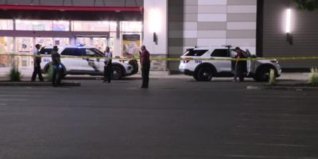 Police inspecting scene outside of TJ Maxx