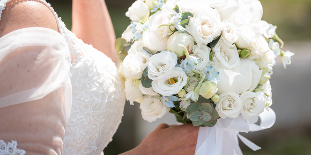 bride at wedding, no face showing