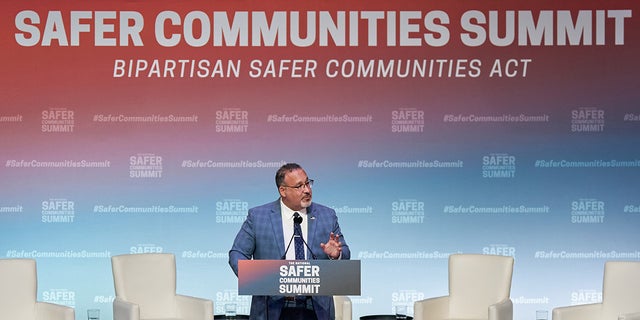 Miguel Cardona, US secretary of education, speaks during the National Safer Communities Summit at Hartford University in West Hartford, Connecticut, US, on Friday, June 16, 2023. The Biden administration is taking steps to make it easier for young people, particularly those affected by violence, to receive mental health services, part of a move to bolster federal gun-safety efforts following the Bipartisan Safer Communities Act that was signed into law last year. Photographer: Bing Guan/Bloomberg