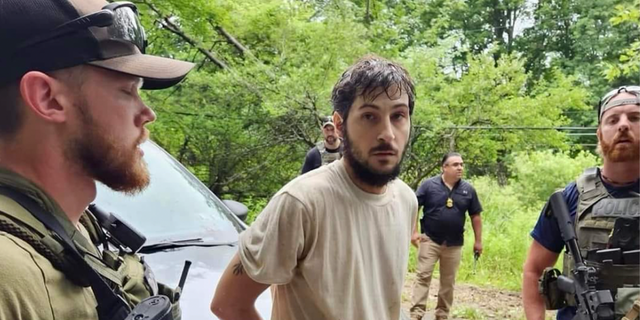 New Photos Show Fugitive Murder Suspect Michael Burham During Arrest ...