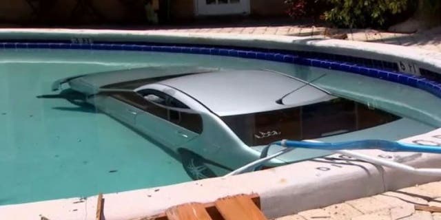 submerged car in Florida pool