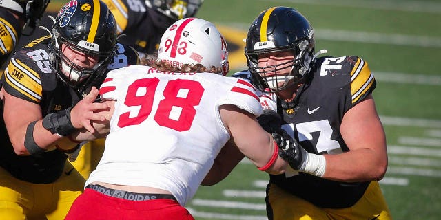 Cody Ince blocks a Nebraska player during a 2020 game