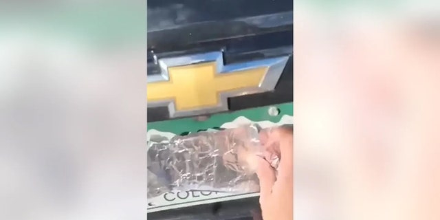 aluminum foil covers license plate