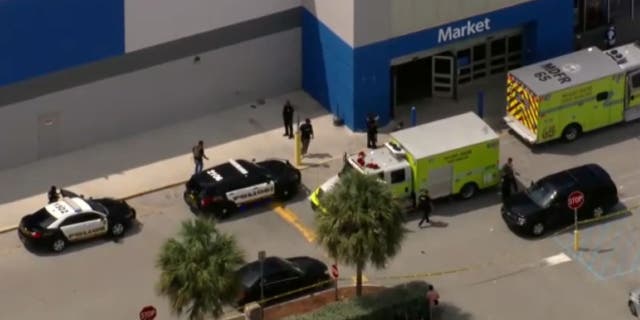 Aerials of police cars at Walmart